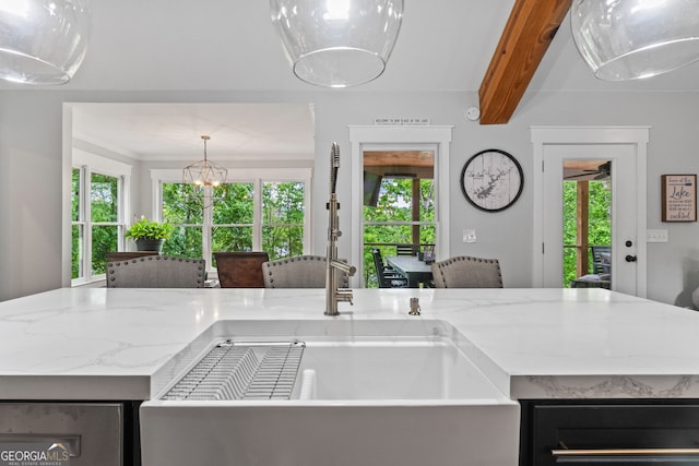 5527 Little River Cir, Gainesville, GA 30506 - kitchen with a wealth of natural light, light stone counters, and a sink