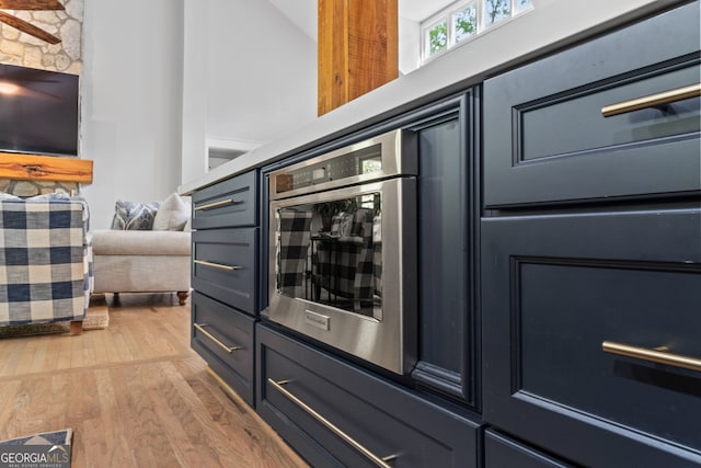 5527 Little River Cir, Gainesville, GA 30506 - room details featuring wood finished floors and stainless steel oven