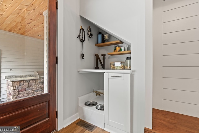 5527 Little River Cir, Gainesville, GA 30506 - bar area featuring wood finished floors, wooden ceiling, and baseboards