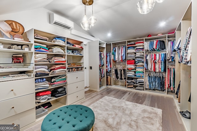 5527 Little River Cir, Gainesville, GA 30506 - spacious closet featuring an AC wall unit, wood finished floors, and lofted ceiling