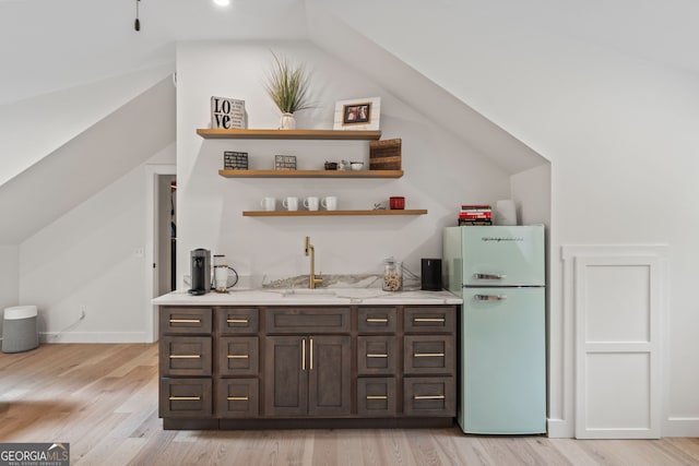 5527 Little River Cir, Gainesville, GA 30506 - indoor wet bar with freestanding refrigerator, light wood-type flooring, lofted ceiling, and baseboards