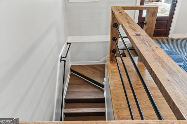 5527 Little River Cir, Gainesville, GA 30506 - staircase with wood finished floors and baseboards