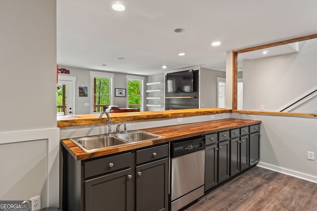 5527 Little River Cir, Gainesville, GA 30506 - kitchen with butcher block countertops, stainless steel dishwasher, a sink, dark wood finished floors, and recessed lighting
