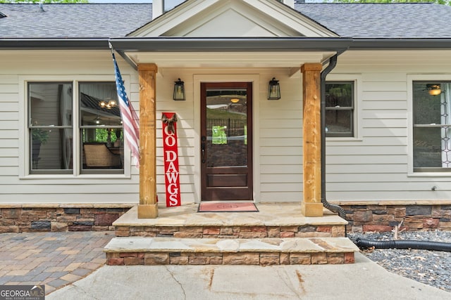 5527 Little River Cir, Gainesville, GA 30506 - property entrance featuring a porch and roof with shingles