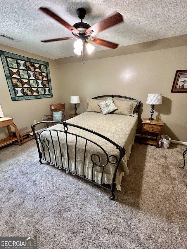 2118 Deer Run Cir, Tifton, GA 31793 - carpeted bedroom with a textured ceiling and ceiling fan
