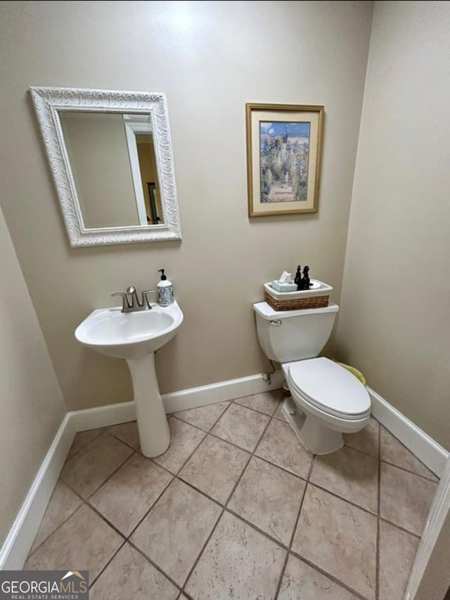 2118 Deer Run Cir, Tifton, GA 31793 - bathroom with tile patterned flooring, toilet, and baseboards