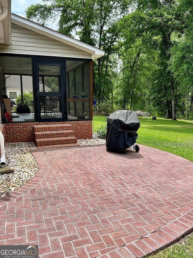 2118 Deer Run Cir, Tifton, GA 31793 - view of patio with a sunroom and a grill