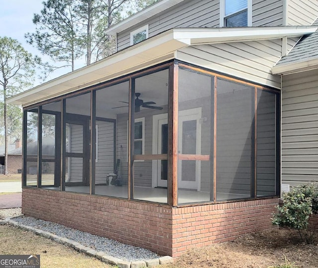 2118 Deer Run Cir, Tifton, GA 31793 - view of home's exterior with a sunroom and brick siding