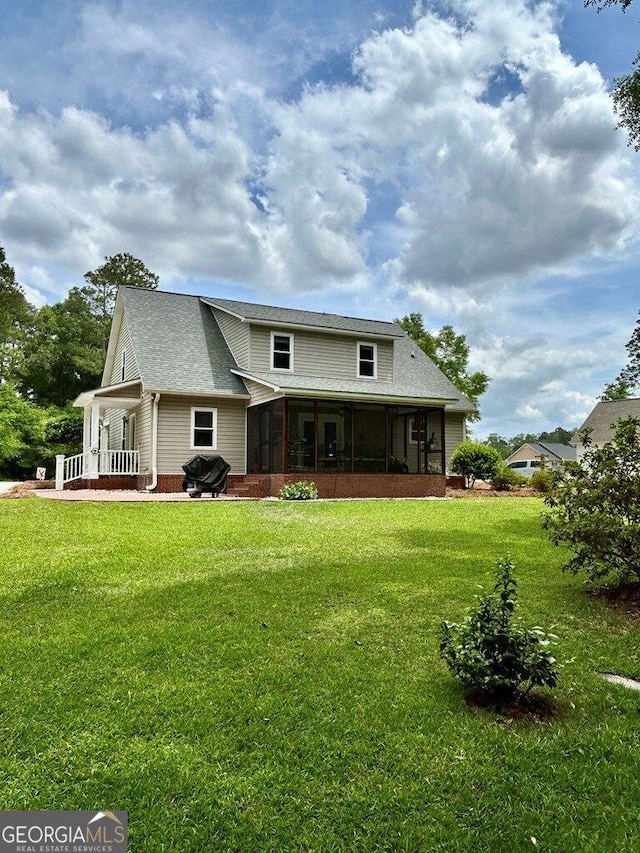 2118 Deer Run Cir, Tifton, GA 31793 - back of house featuring a sunroom and a yard
