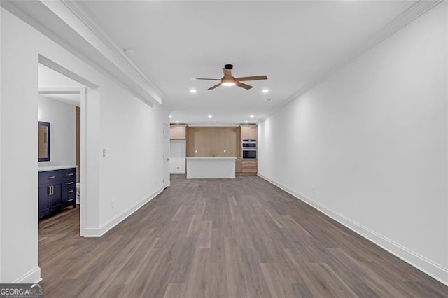 unfurnished living room with recessed lighting, ceiling fan, dark wood finished floors, and baseboards