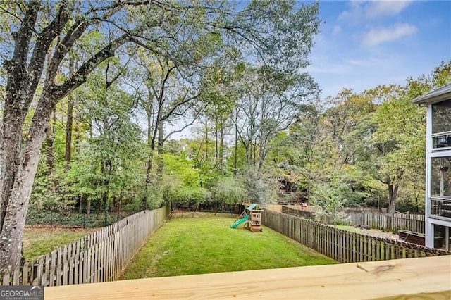 2244 Spink St NW, Atlanta, GA 30318 - fenced backyard with a playground