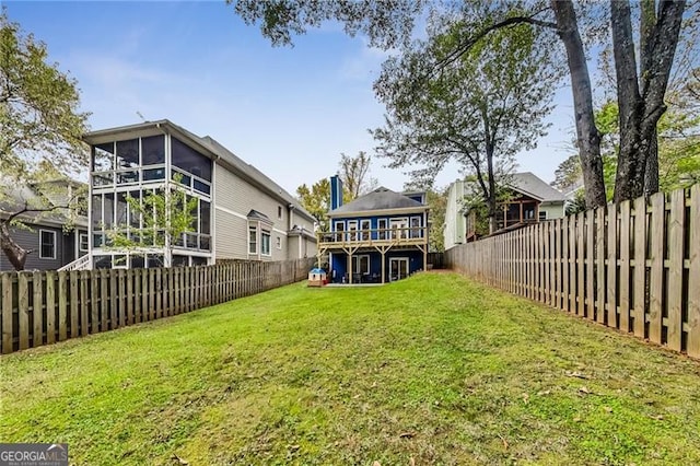 2244 Spink St NW, Atlanta, GA 30318 - fenced backyard with a sunroom