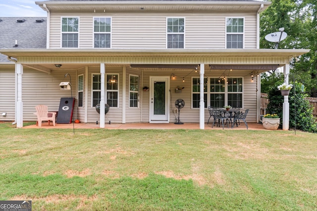 view of front of home featuring a patio area and a front yard