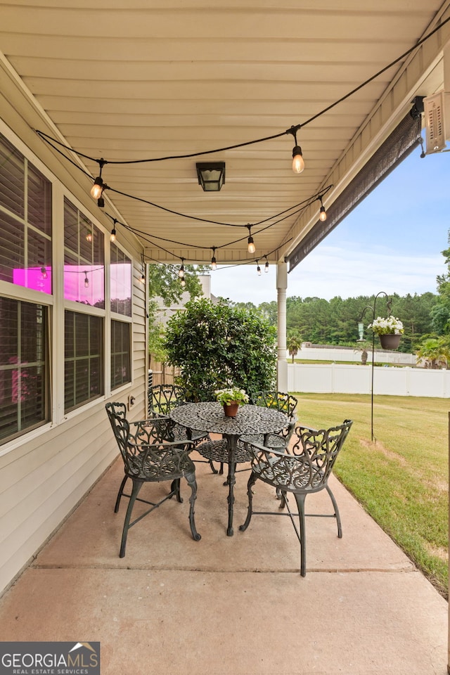 view of patio / terrace with fence