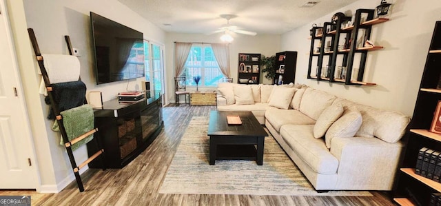 89 Tiller Way, Port Wentworth, GA 31407 - living area with baseboards, a ceiling fan, wood finished floors, and visible vents
