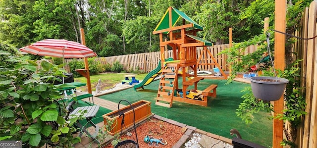 89 Tiller Way, Port Wentworth, GA 31407 - view of playground with a yard and a fenced backyard
