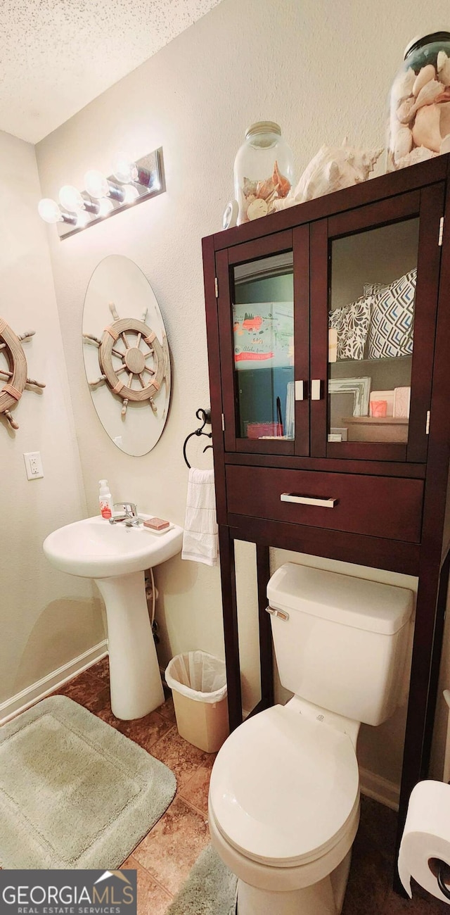 89 Tiller Way, Port Wentworth, GA 31407 - half bath with toilet, a textured ceiling, and baseboards