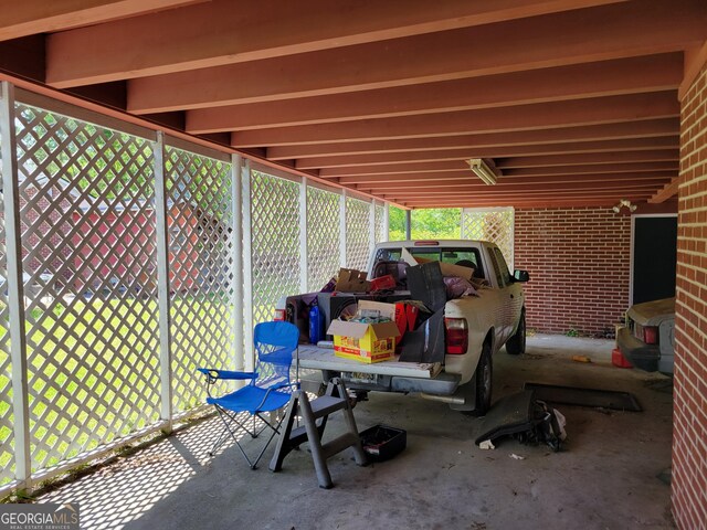 206 New Dr, Claxton, GA 30417 - view of patio featuring a carport