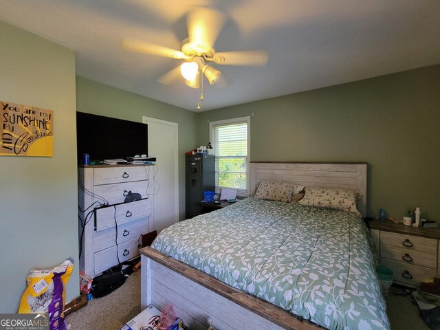 206 New Dr, Claxton, GA 30417 - bedroom featuring carpet flooring and a ceiling fan