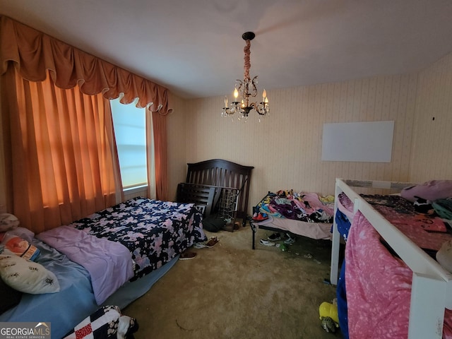 206 New Dr, Claxton, GA 30417 - carpeted bedroom featuring a chandelier