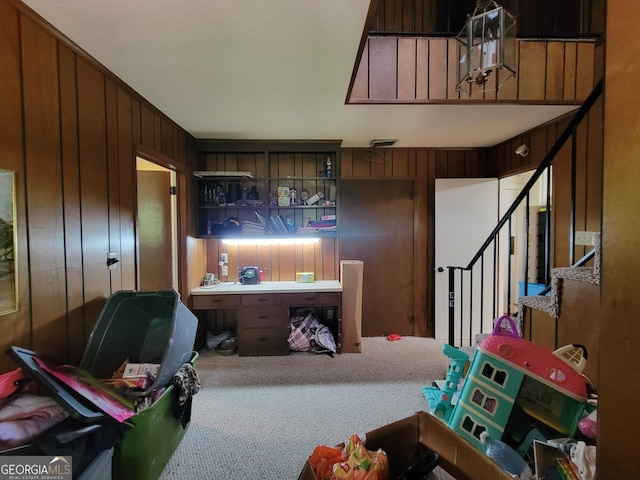 206 New Dr, Claxton, GA 30417 - interior space with stairway, carpet floors, and wood walls
