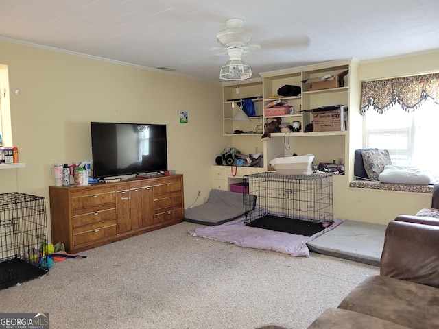 206 New Dr, Claxton, GA 30417 - living area featuring carpet floors, ornamental molding, and a ceiling fan