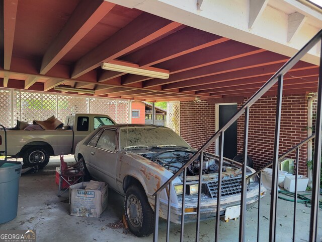 206 New Dr, Claxton, GA 30417 - view of vehicle parking with an attached carport