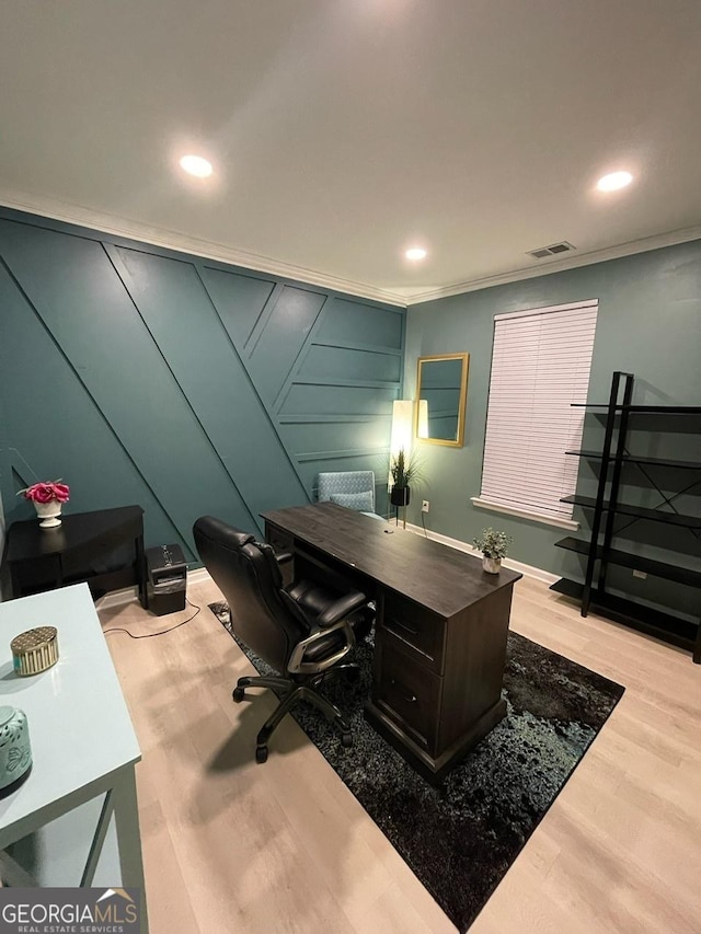 office featuring visible vents, recessed lighting, light wood finished floors, and crown molding