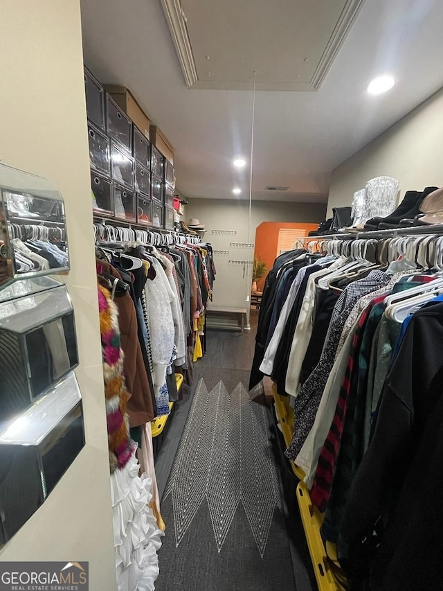 spacious closet with attic access
