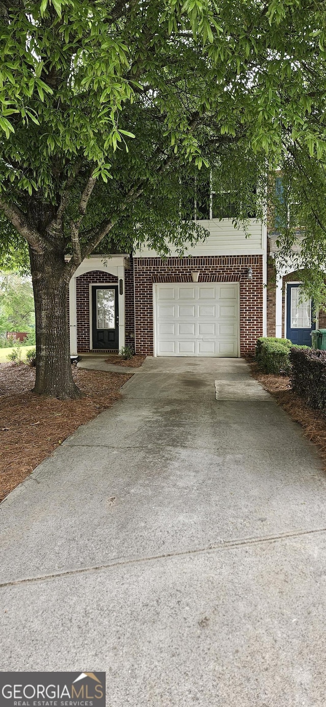 2867 Snapfinger Mnr, Decatur, GA 30035 - view of front of house with brick siding and concrete driveway