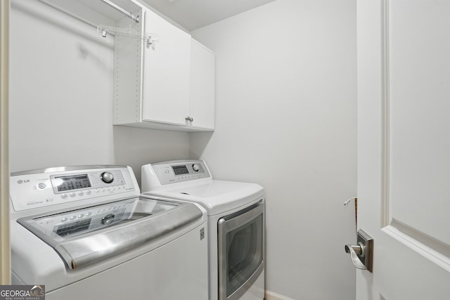 104 Glentown Way, Sandy Springs, GA 30328 - washroom featuring cabinet space and washing machine and dryer