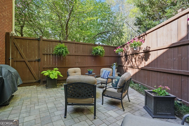 104 Glentown Way, Sandy Springs, GA 30328 - view of patio / terrace with area for grilling, a gate, and a fenced backyard