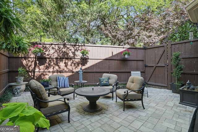 104 Glentown Way, Sandy Springs, GA 30328 - view of patio with a fenced backyard and outdoor lounge area