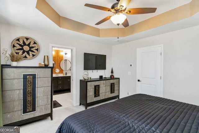 371 Northaven Ave, Suwanee, GA 30024 - bedroom featuring light colored carpet, connected bathroom, a raised ceiling, and a ceiling fan