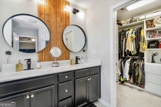 371 Northaven Ave, Suwanee, GA 30024 - full bathroom with double vanity, a ceiling fan, a spacious closet, and wooden walls