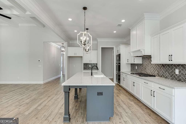 kitchen with stainless steel appliances, crown molding, white cabinets, decorative backsplash, and recessed lighting