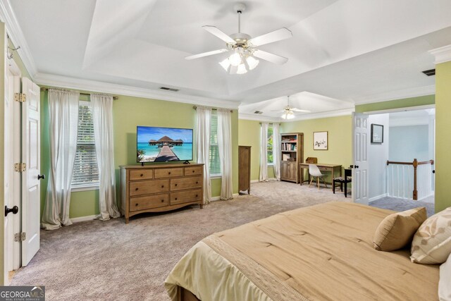 2267 Howell Farms Trl, Acworth, GA 30101 - carpeted bedroom featuring a tray ceiling, baseboards, visible vents, a ceiling fan, and crown molding