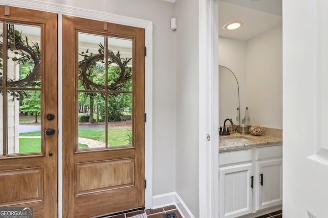 400 Peachtree Pkwy, Peachtree City, GA 30269 - doorway to outside featuring bar with sink and baseboards