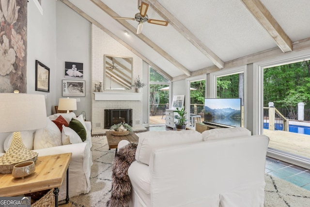 400 Peachtree Pkwy, Peachtree City, GA 30269 - tiled living room with a ceiling fan and a brick fireplace