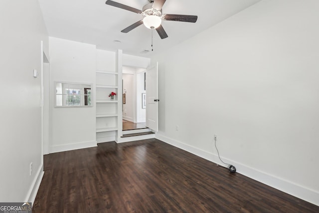 400 Peachtree Pkwy, Peachtree City, GA 30269 - empty room with dark wood-style floors, baseboards, and a ceiling fan