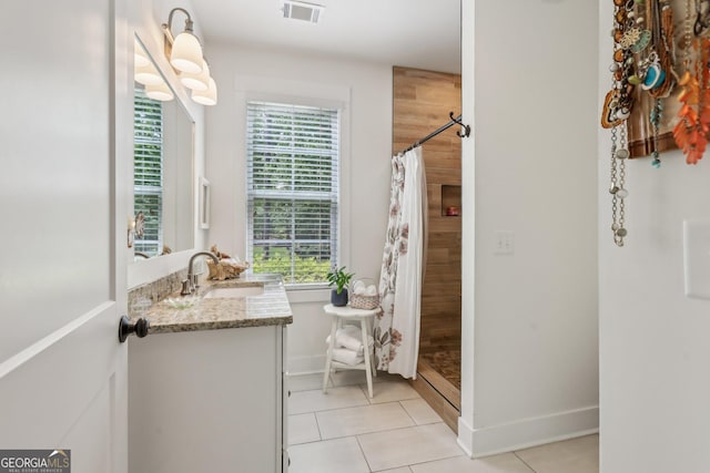 400 Peachtree Pkwy, Peachtree City, GA 30269 - bathroom with a stall shower, tile patterned flooring, vanity, and baseboards