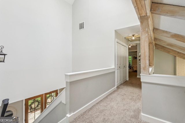 400 Peachtree Pkwy, Peachtree City, GA 30269 - hallway featuring carpet, high vaulted ceiling, healthy amount of natural light, an upstairs landing, and baseboards