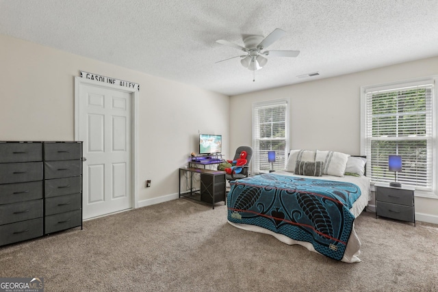 400 Peachtree Pkwy, Peachtree City, GA 30269 - bedroom featuring carpet flooring, a textured ceiling, baseboards, and a ceiling fan