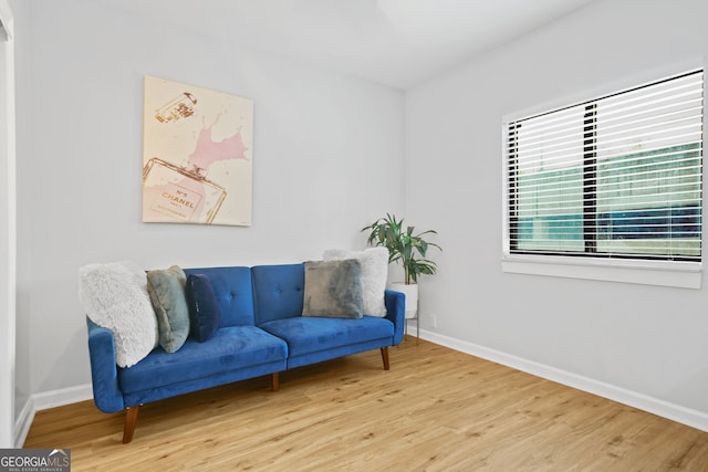 3481 Lakeside Dr NE Unit 601, Atlanta, GA 30326 - living area featuring baseboards and wood finished floors