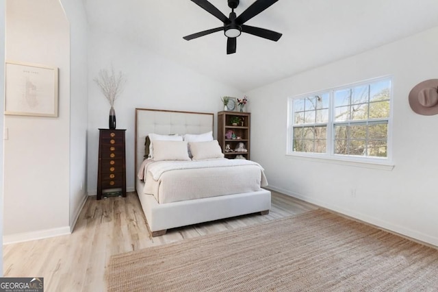 384 Teal Ct, Roswell, GA 30076 - bedroom with lofted ceiling, baseboards, wood finished floors, and ceiling fan