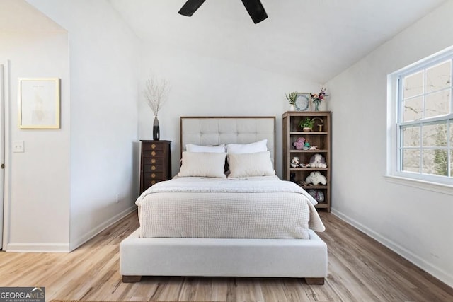 384 Teal Ct, Roswell, GA 30076 - bedroom with lofted ceiling, baseboards, light wood-style floors, and ceiling fan
