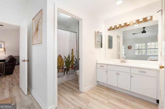 384 Teal Ct, Roswell, GA 30076 - full bathroom with ensuite bathroom, wood finished floors, ceiling fan, and toilet