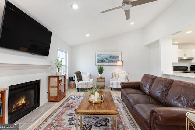384 Teal Ct, Roswell, GA 30076 - living room with recessed lighting, vaulted ceiling, a ceiling fan, and light wood-style flooring