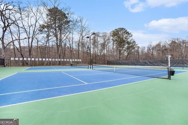 384 Teal Ct, Roswell, GA 30076 - view of tennis court with fence and community basketball court