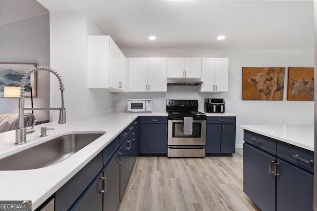 384 Teal Ct, Roswell, GA 30076 - kitchen with a sink, stainless steel electric stove, white microwave, white cabinets, and under cabinet range hood